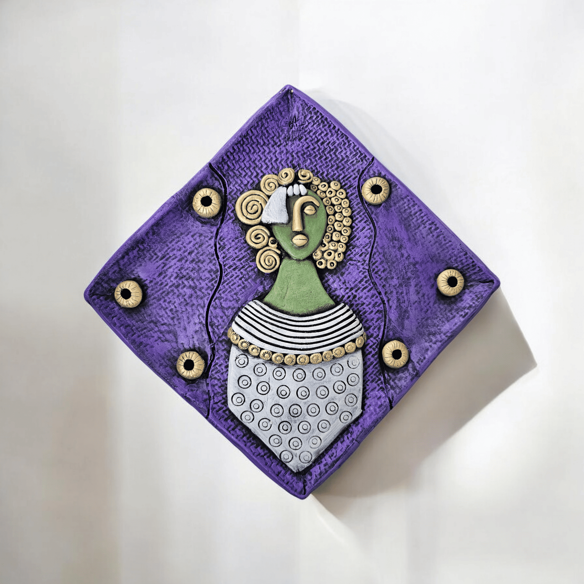 Terracotta wall doll